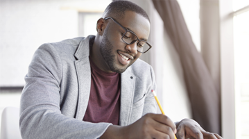 man holding a pencil