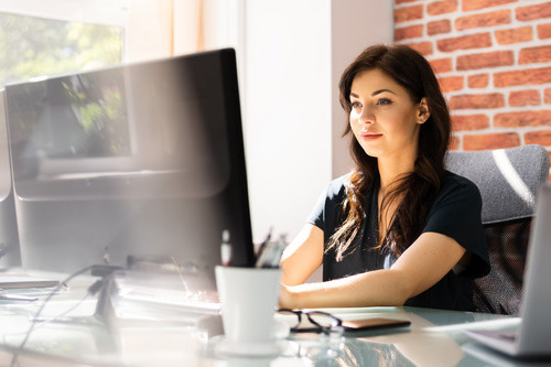 woman in front of a computer