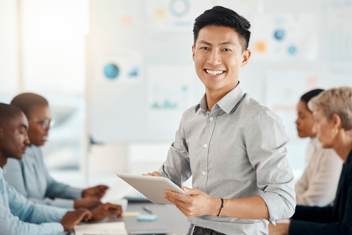 businessman holding a tablet